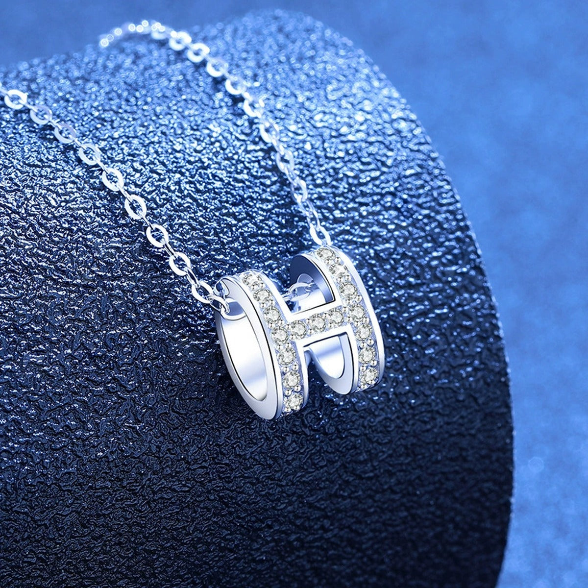 Pave Letter H Moissanite Pendant Necklace in White Gold-Plated S925 Sterling Silver blue background product view