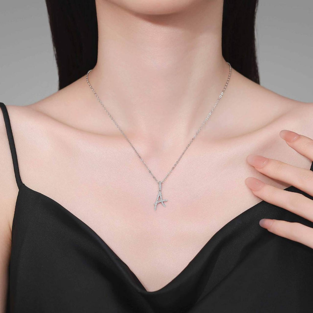 Initial Moissanite Pendant Necklace in Platinum-Plated S925 Sterling Silver worn on neckline by model