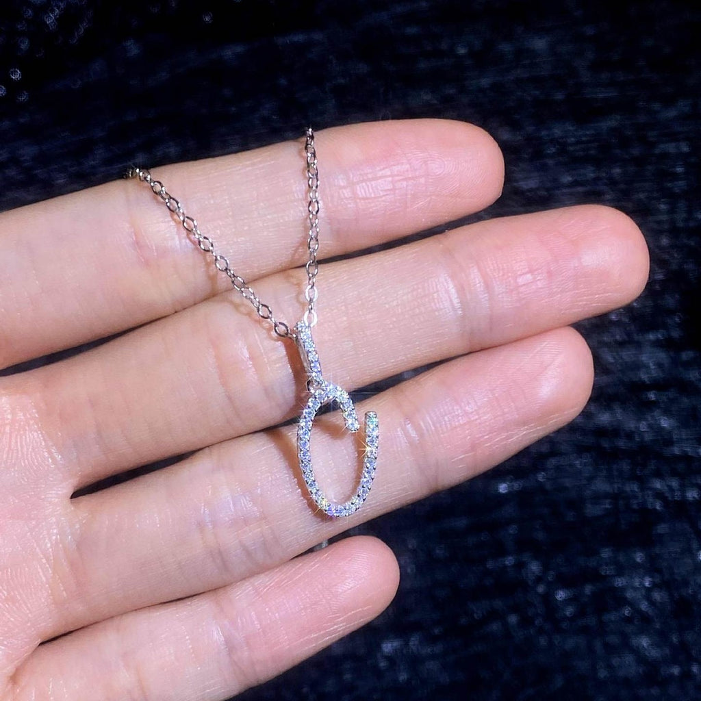 Initial Moissanite Pendant Necklace in Platinum-Plated S925 Sterling Silver dark background product display view