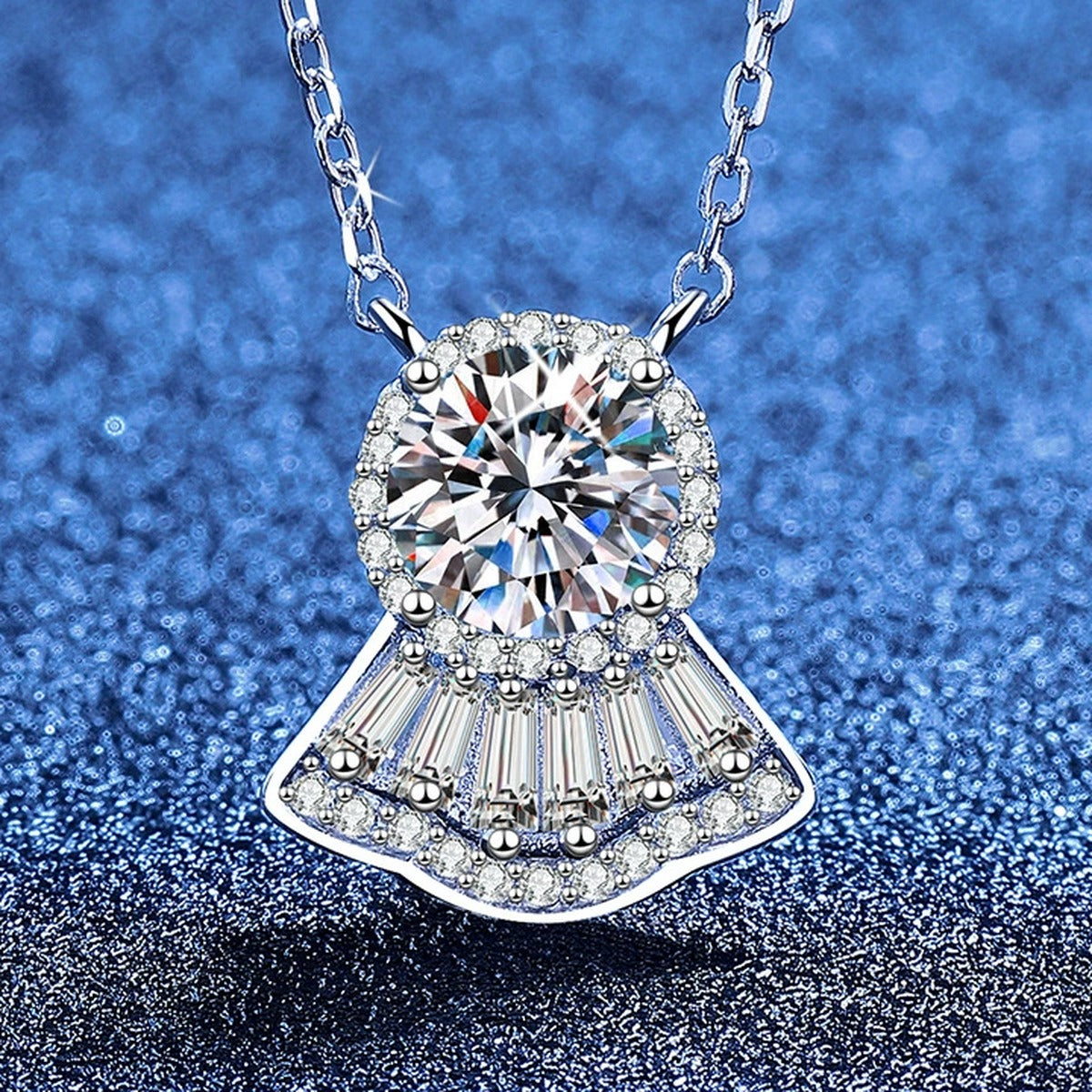 Fan Moissanite Pendant Necklace with Cubic Zirconia in White Gold-Plated S925 Sterling Silver blue background angled view