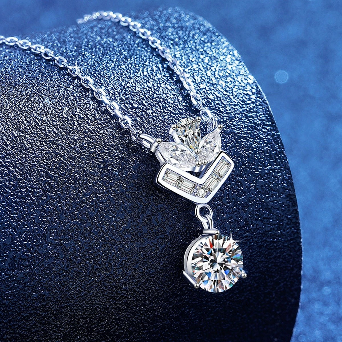 Chevron Moissanite Pendant Necklace with Cubic Zirconia in White Gold-Plated S925 Sterling Silver blue background product view