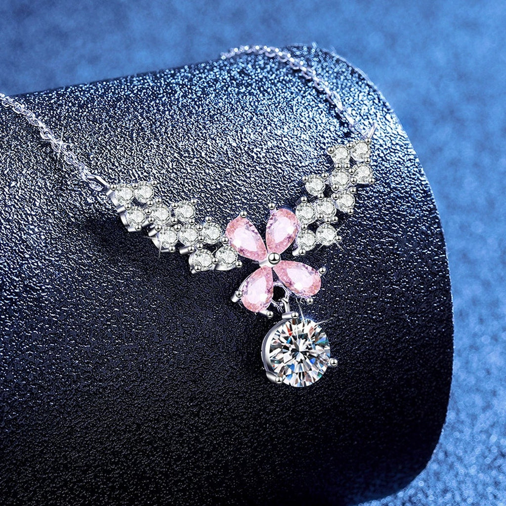 Pink Moissanite Pendant Necklace with Cubic Zirconia in White Gold-Plated S925 Sterling Silver blue background angled view