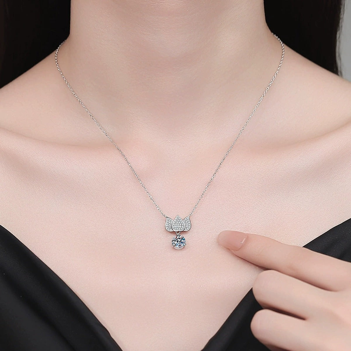 Butterfly Moissanite Pendant Necklace with Cubic Zirconia in White Gold-Plated S925 Sterling Silver worn on neckline by model
