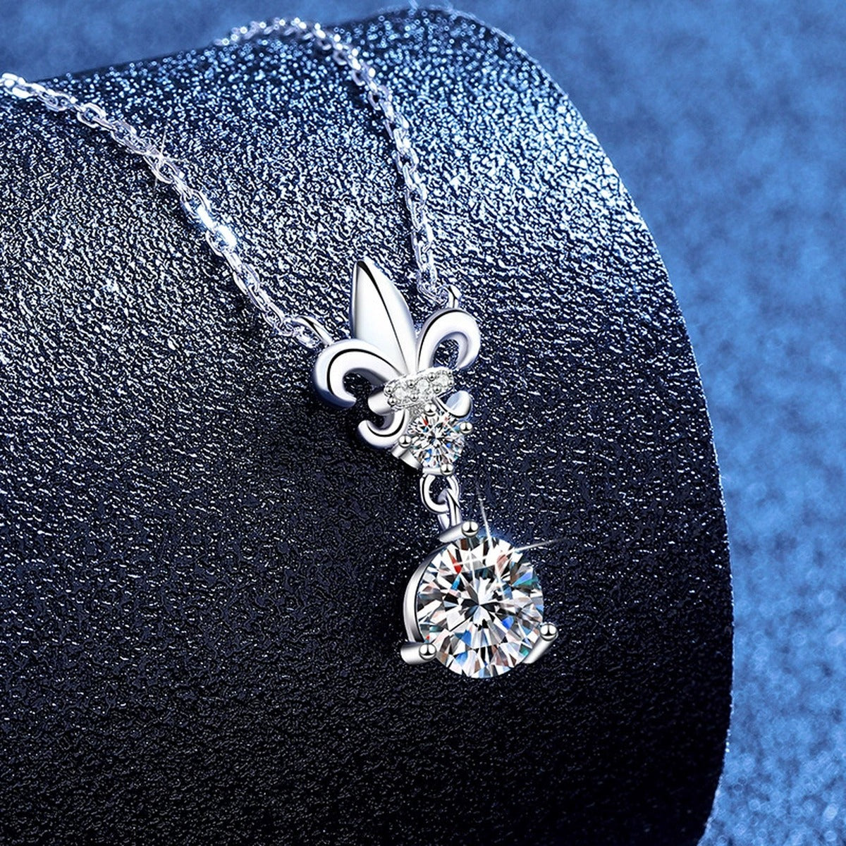 Floral Moissanite Pendant Necklace with Cubic Zirconia in White Gold-Plated S925 Sterling Silver blue background angled view