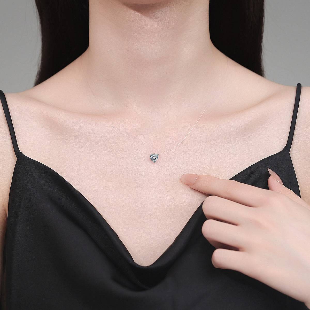 Shape Moissanite Pendant Necklace in White Gold-Plated S925 Sterling Silver worn on neckline by model