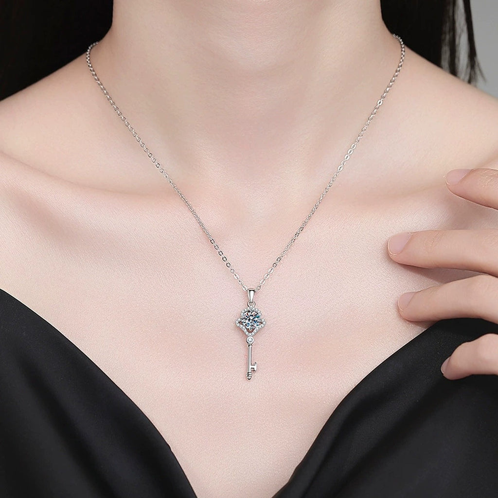 Key Moissanite Pendant Necklace with Cubic Zirconia in White Gold-Plated S925 Sterling Silver worn on neckline by model