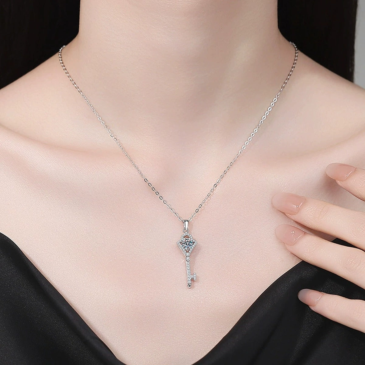 Round Moissanite Pendant Necklace with Cubic Zirconia in White Gold-Plated S925 Sterling Silver worn on neckline by model