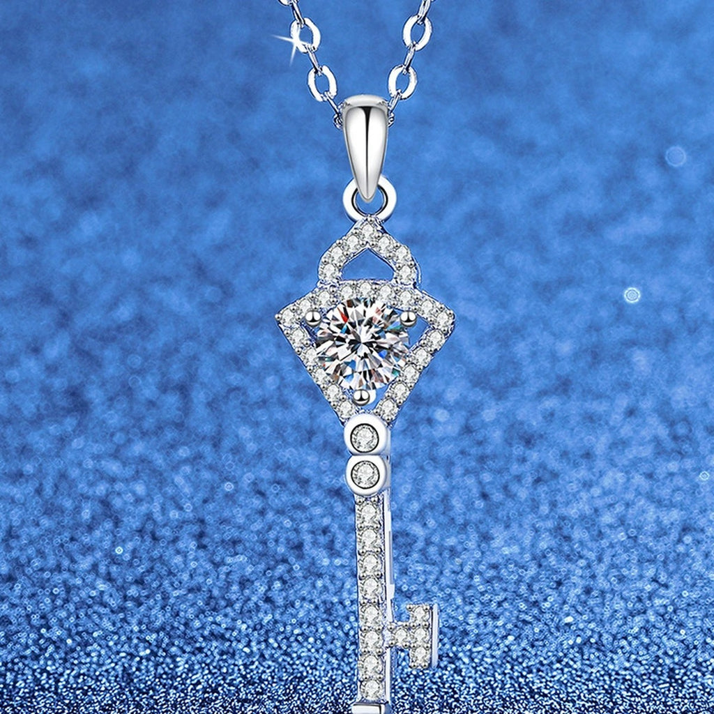 Round Moissanite Pendant Necklace with Cubic Zirconia in White Gold-Plated S925 Sterling Silver blue background angled view