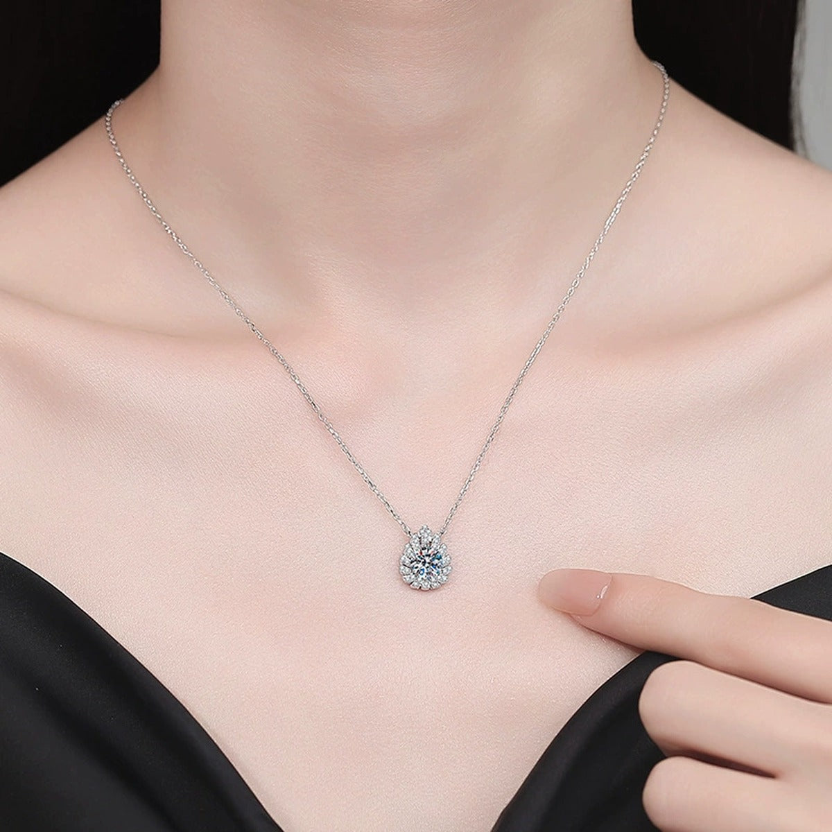Floral Moissanite Pendant Necklace with Cubic Zirconia in White Gold-Plated S925 Sterling Silver worn on neckline by model