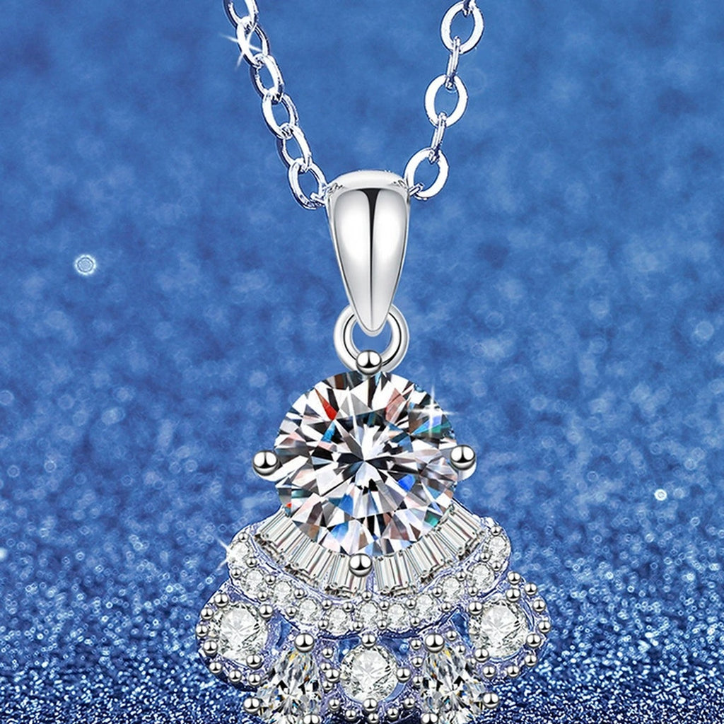Round Moissanite Pendant Necklace with Cubic Zirconia in White Gold-Plated S925 Sterling Silver blue background angled view
