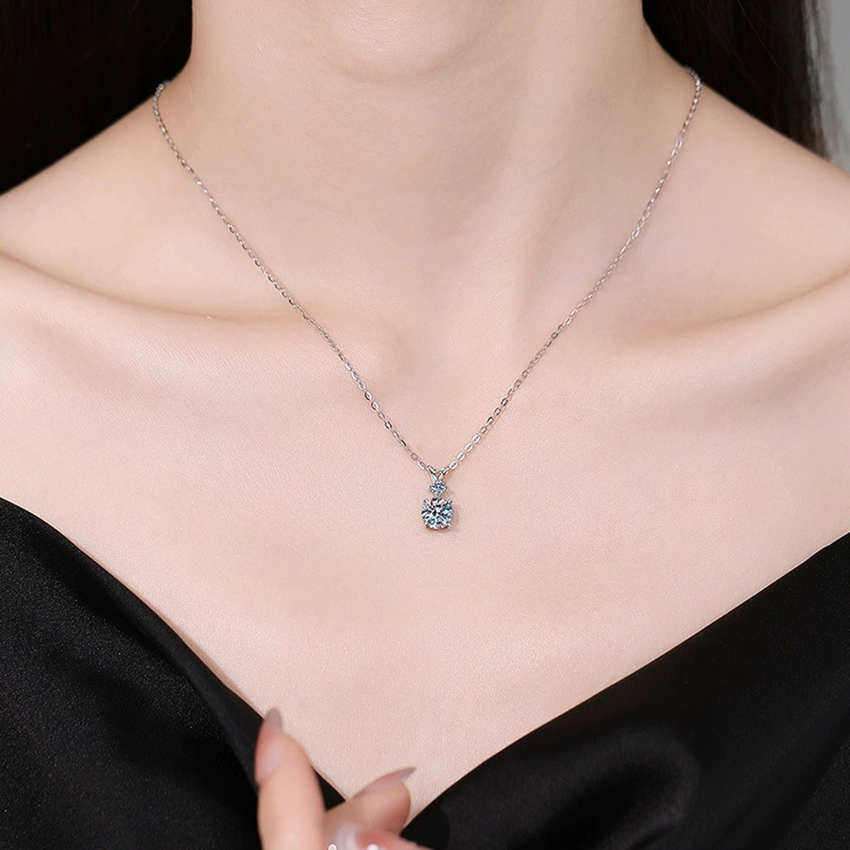 Two-Stone Moissanite Pendant Necklace in S925 Sterling Silver worn on neckline by model
