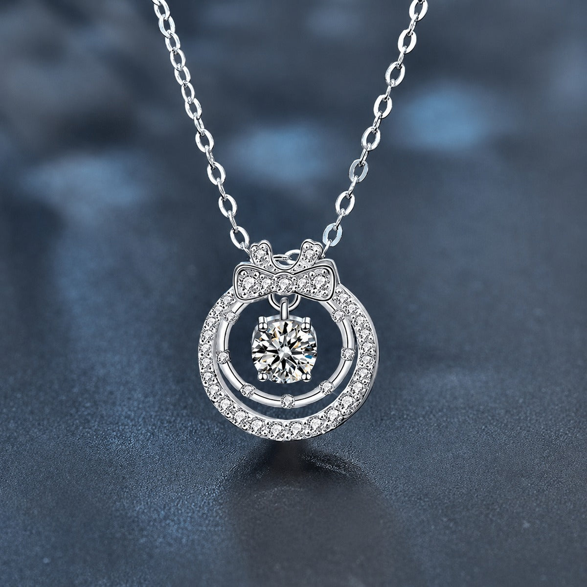 Bow Round Moissanite Necklace with CZ in White Gold-Plated S925 sterling silver close-up product scene showing pendant setting