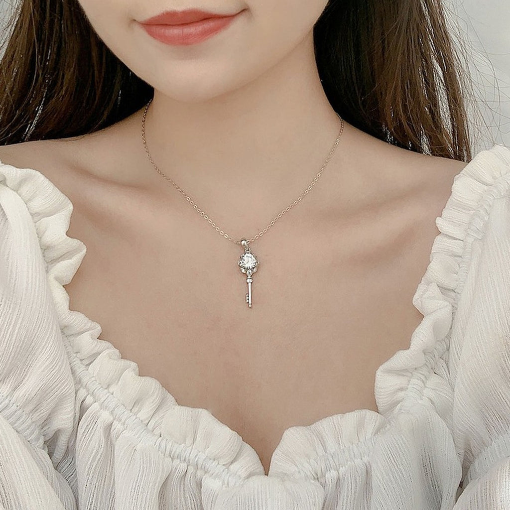 Flower Key Round Moissanite Necklace with CZ in White Gold-Plated S925 sterling silver neckline model view showing pendant scale and chain length