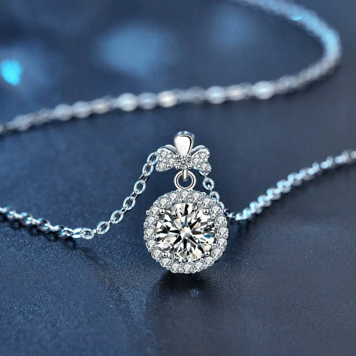 Bowknot Halo Round Moissanite Necklace with CZ in White Gold-Plated S925 sterling silver display scene showing chain and stone layout