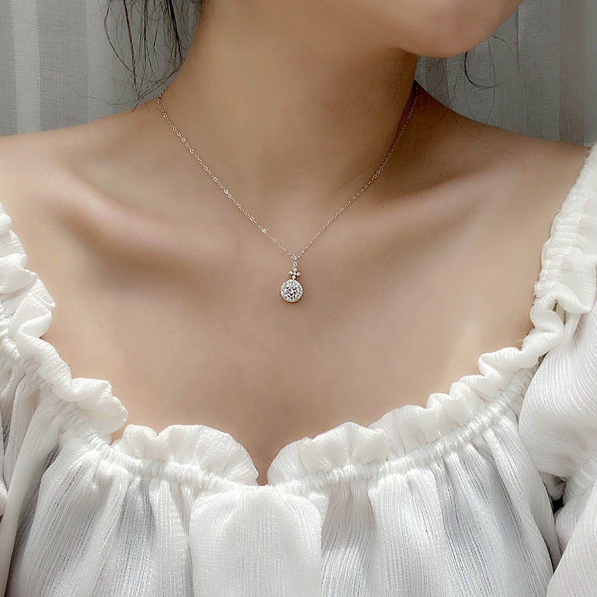 Halo Round Moissanite Necklace with CZ in White Gold-Plated S925 sterling silver neckline model view showing pendant scale and chain length