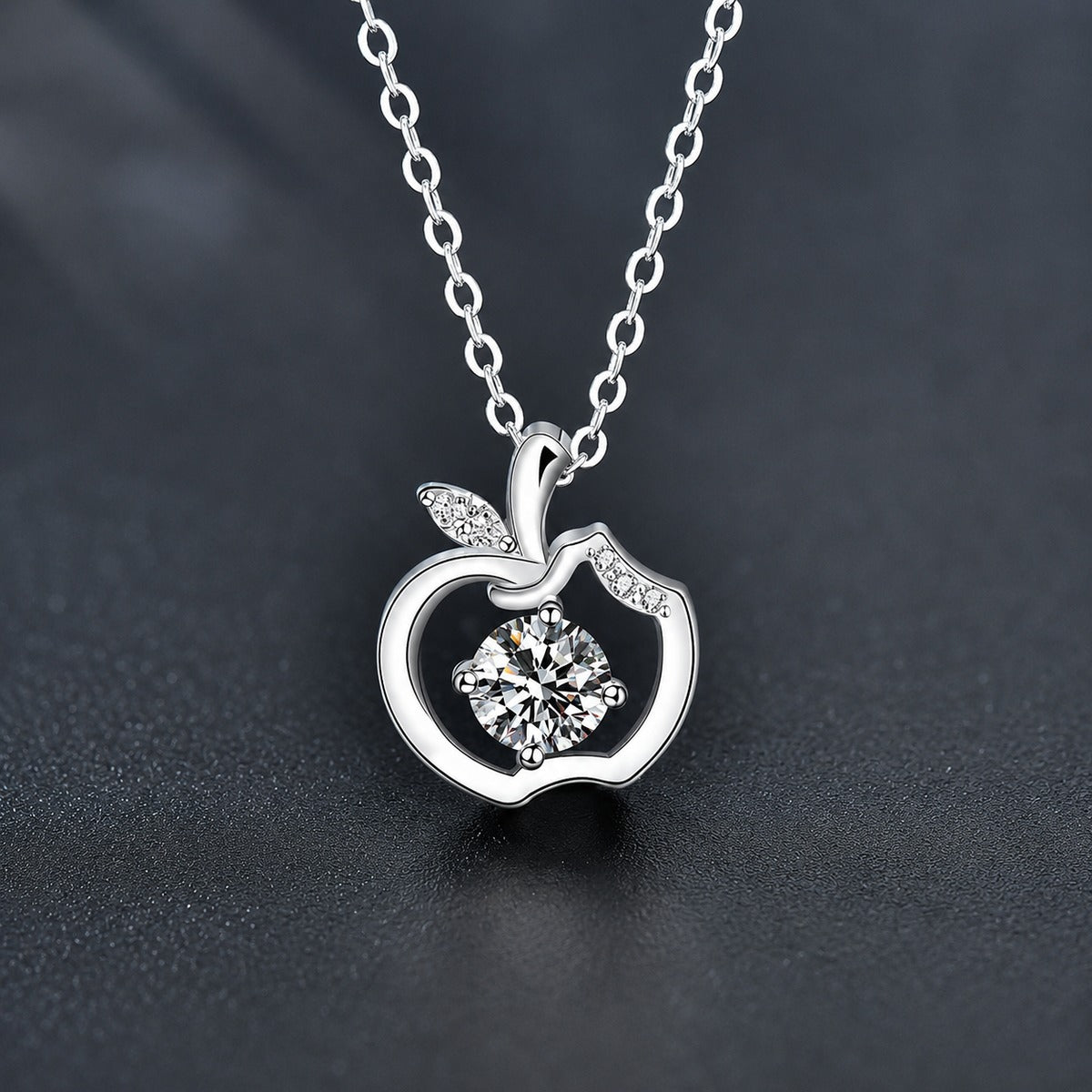 Apple Round Moissanite Necklace with CZ in White Gold-Plated S925 sterling silver close-up product scene showing pendant setting