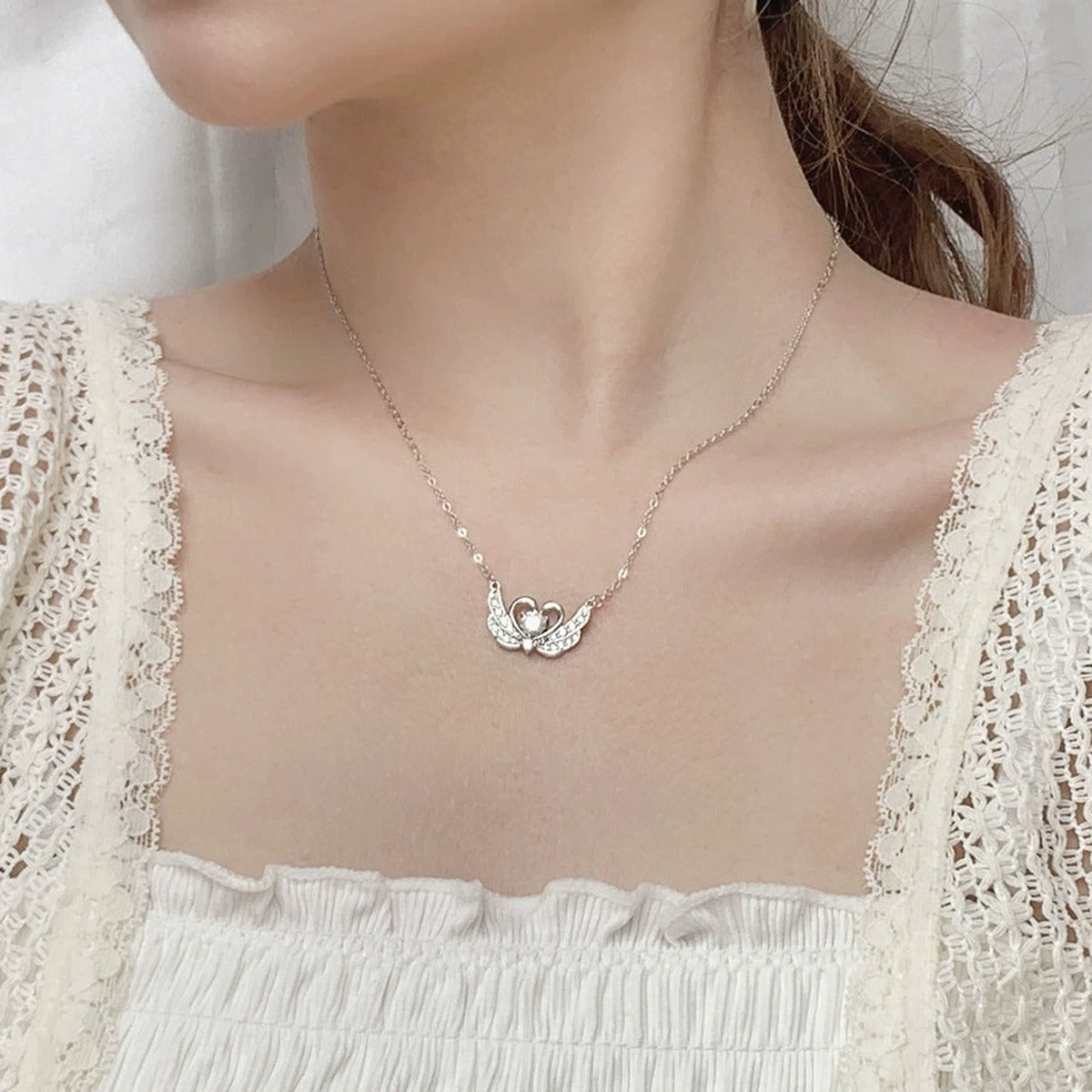 Swan Heart Round Moissanite Necklace with CZ in White Gold-Plated S925 sterling silver neckline model view showing pendant scale and chain length