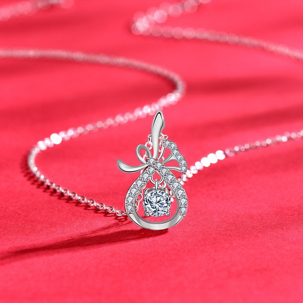 Magic Bag Round Moissanite Necklace with CZ in White Gold-Plated S925 sterling silver close-up product scene showing pendant setting