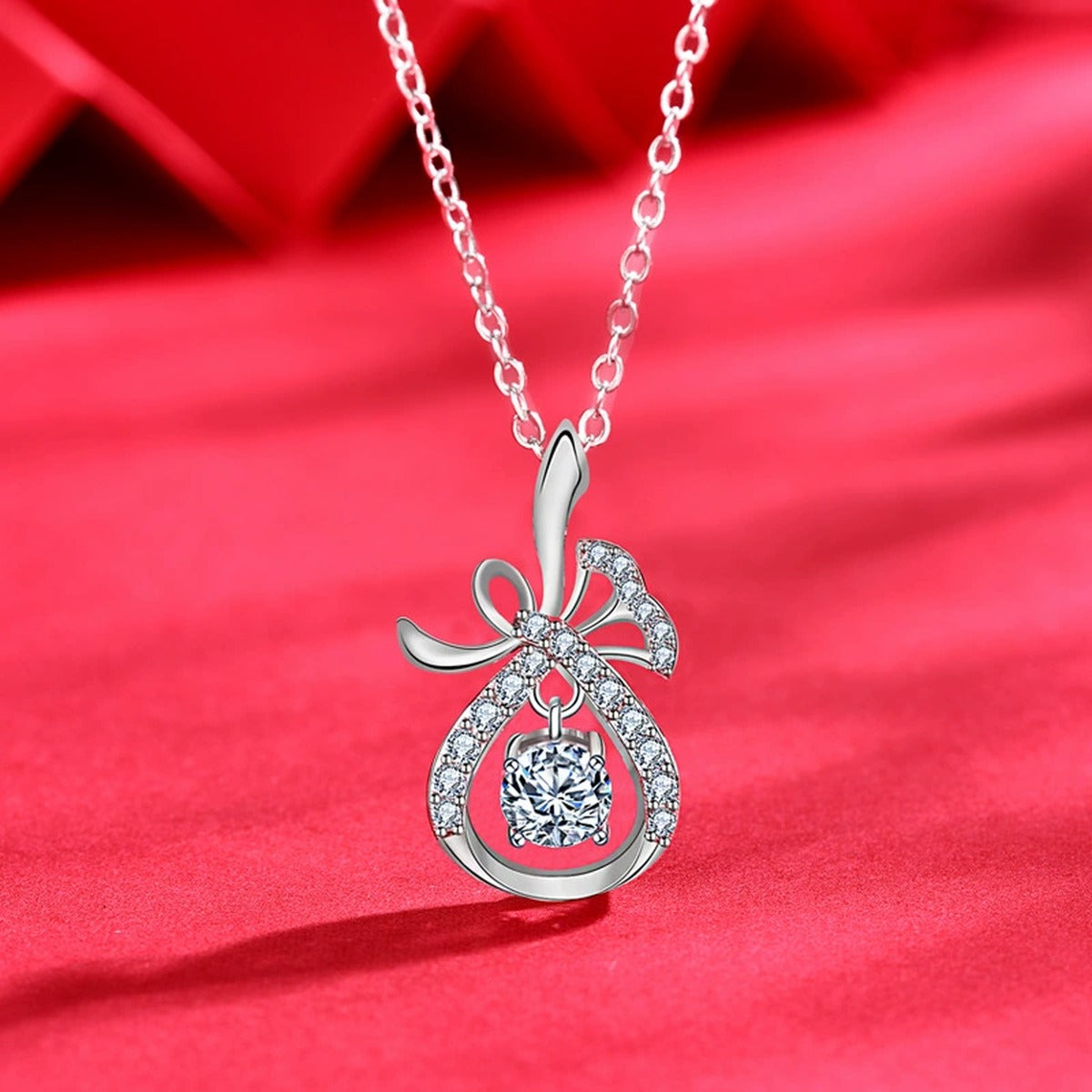 Magic Bag Round Moissanite Necklace with CZ in White Gold-Plated S925 sterling silver blue display scene showing chain and stone layout