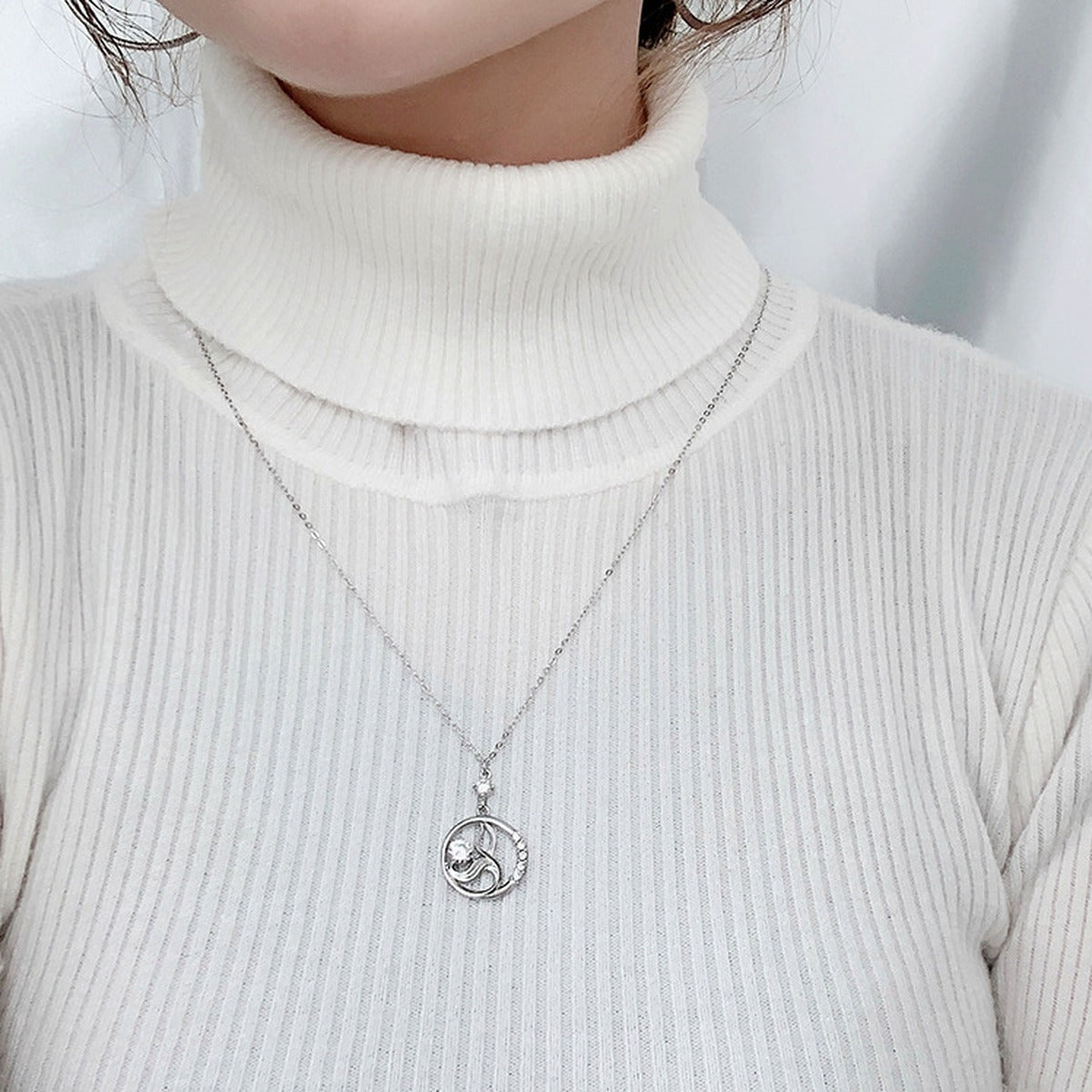 Mermaid Round Moissanite Necklace with CZ in White Gold-Plated S925 sterling silver neckline model view showing pendant scale and chain length