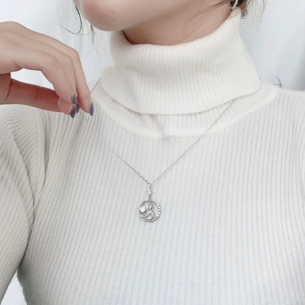 Mermaid Round Moissanite Necklace with CZ in White Gold-Plated S925 sterling silver neckline model view showing pendant scale and chain length