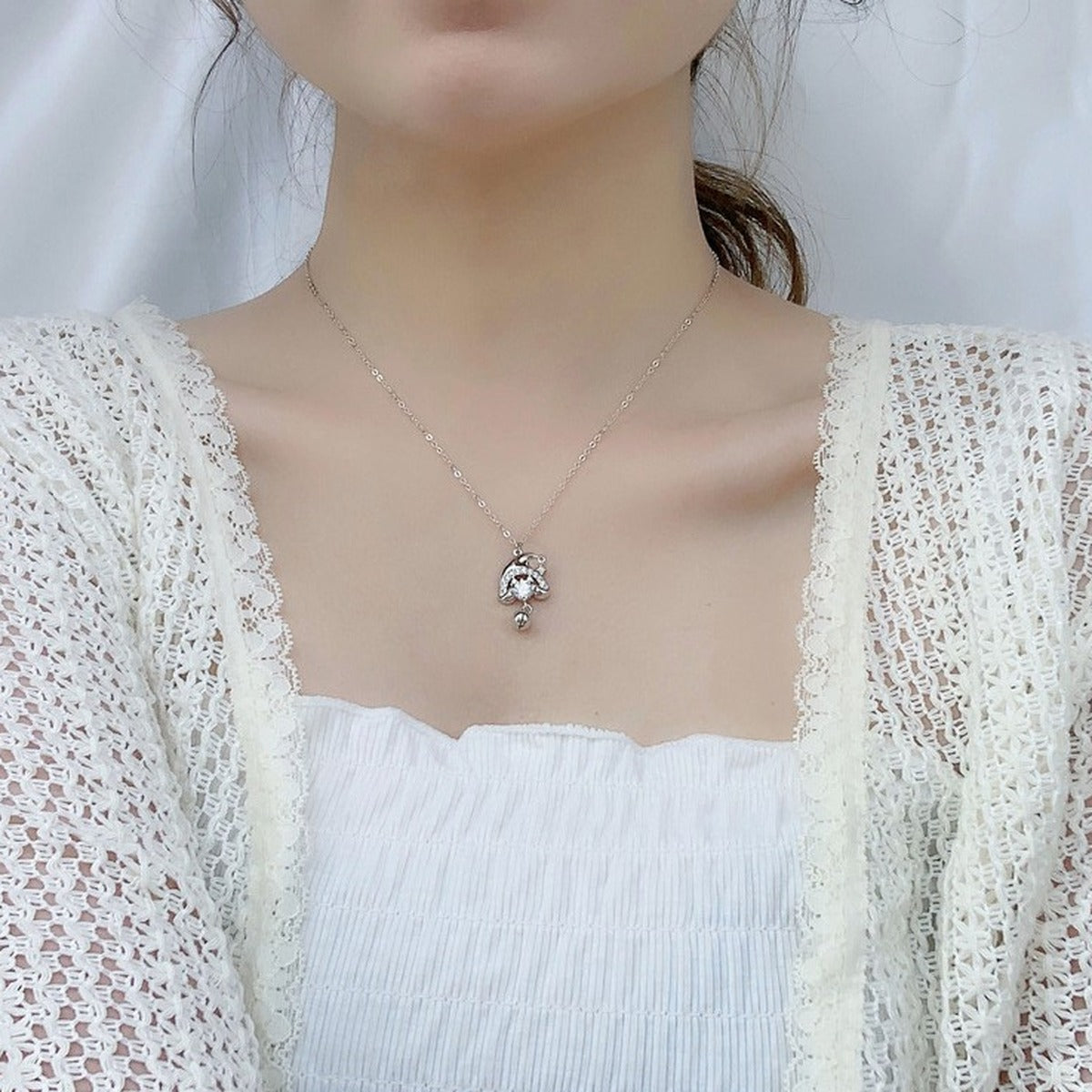 Christmas Hat Round Moissanite Necklace with CZ in White Gold-Plated S925 sterling silver neckline model view showing pendant scale and chain length