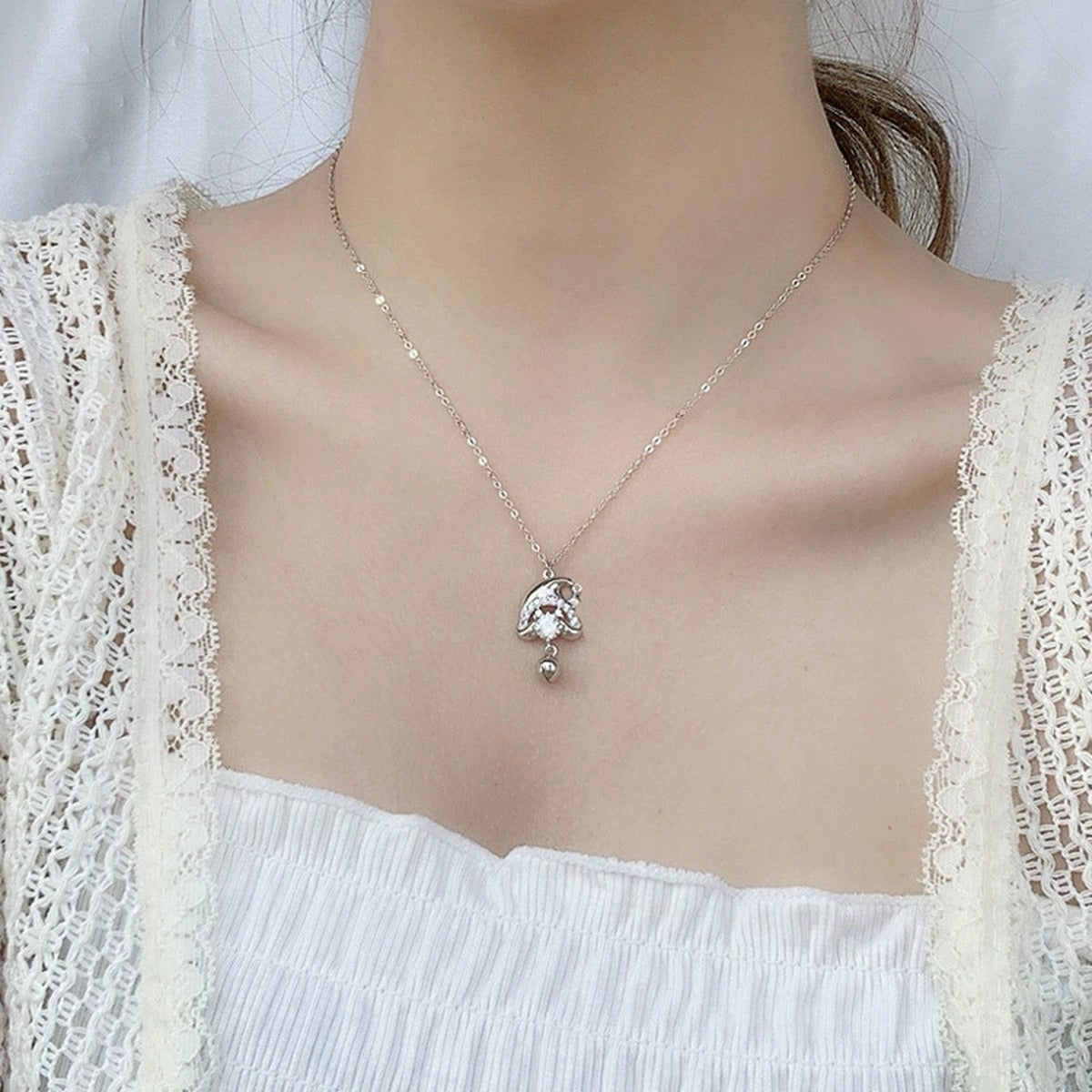 Christmas Hat Round Moissanite Necklace with CZ in White Gold-Plated S925 sterling silver additional worn styling view showing the pendant on the body