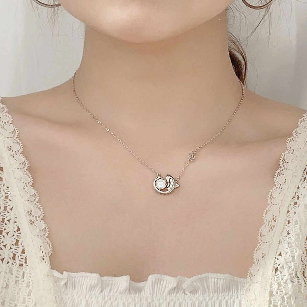 Fish Round Moissanite Necklace with CZ in White Gold-Plated S925 sterling silver blue display scene showing chain and stone layout