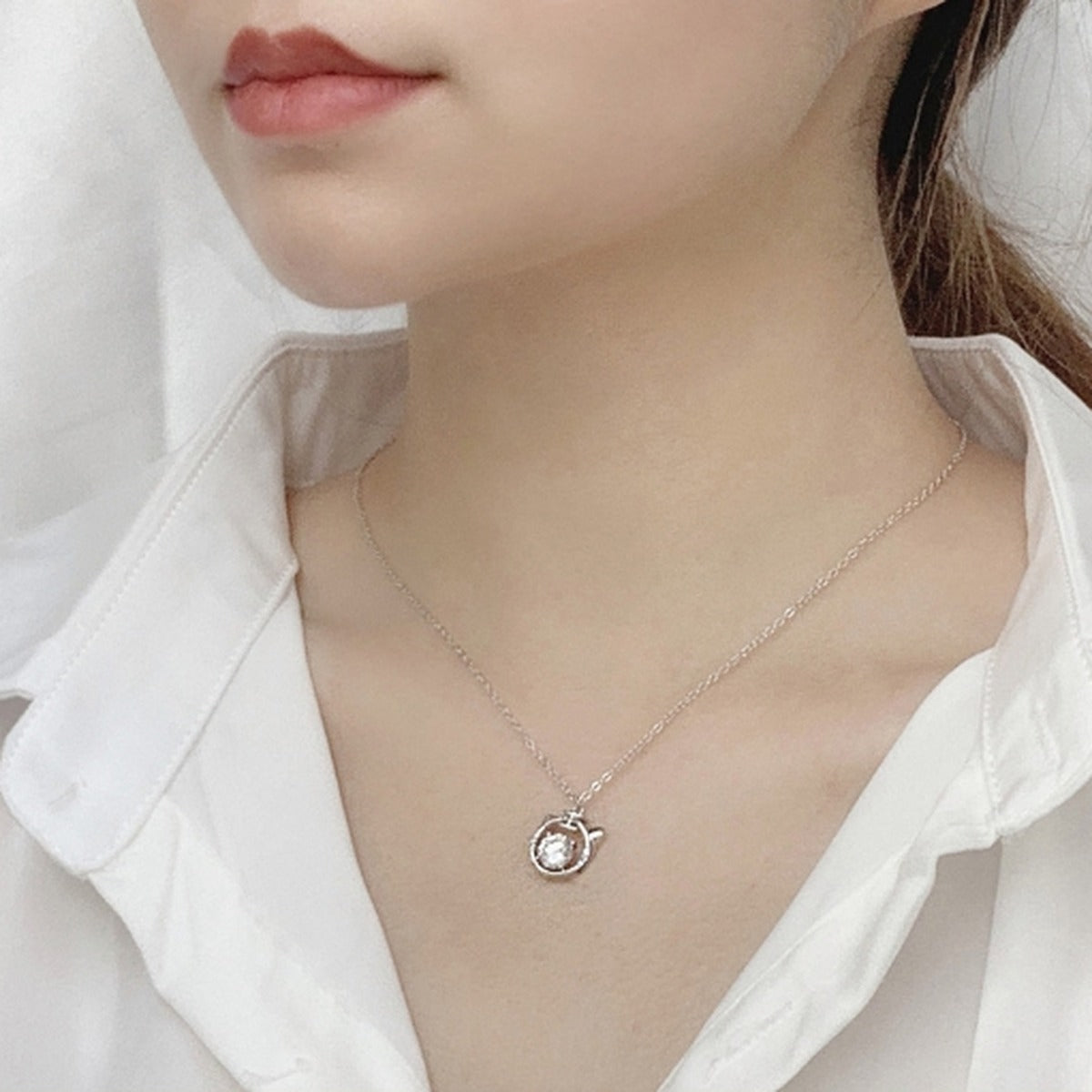 Tiger Round Moissanite Necklace with CZ in White Gold-Plated S925 sterling silver neckline model view showing pendant scale and chain length