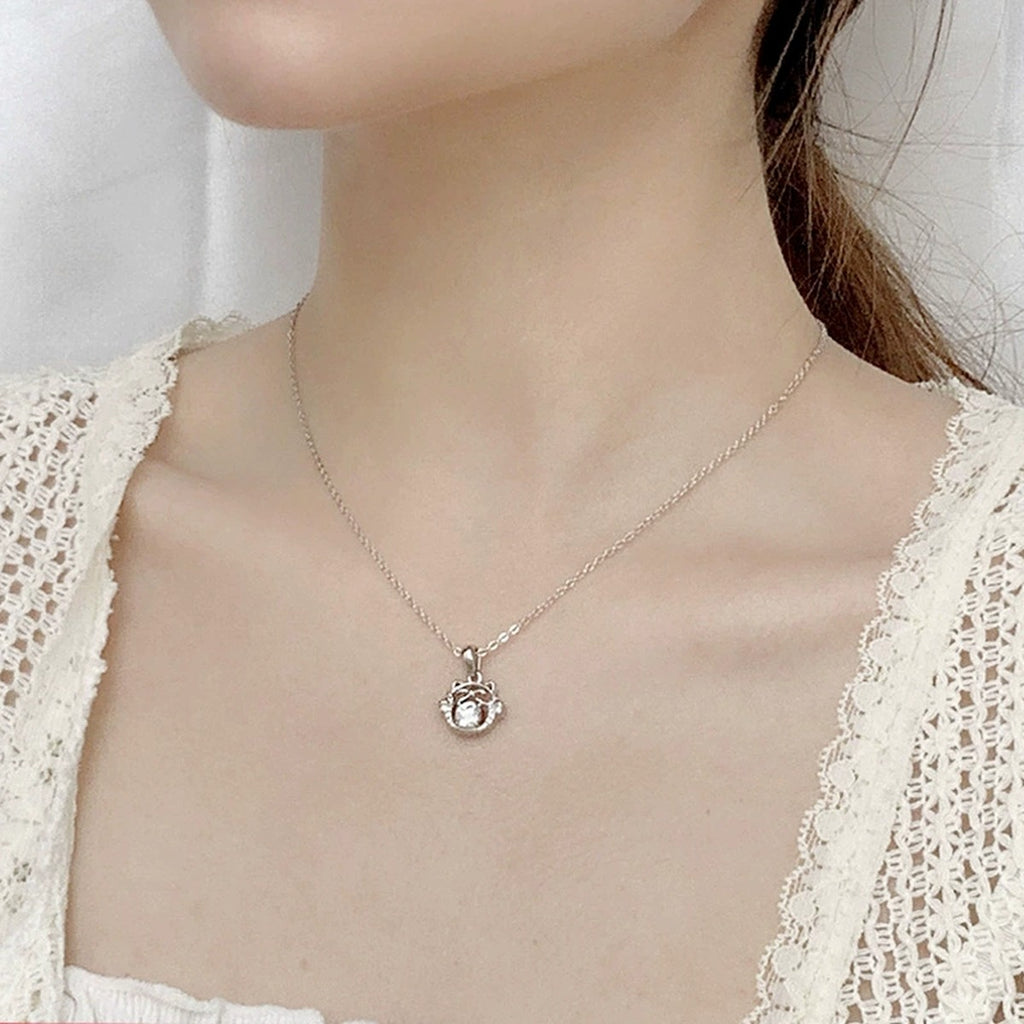 Cat Round Moissanite Necklace with CZ in White Gold-Plated S925 sterling silver neckline model view showing pendant scale and chain length