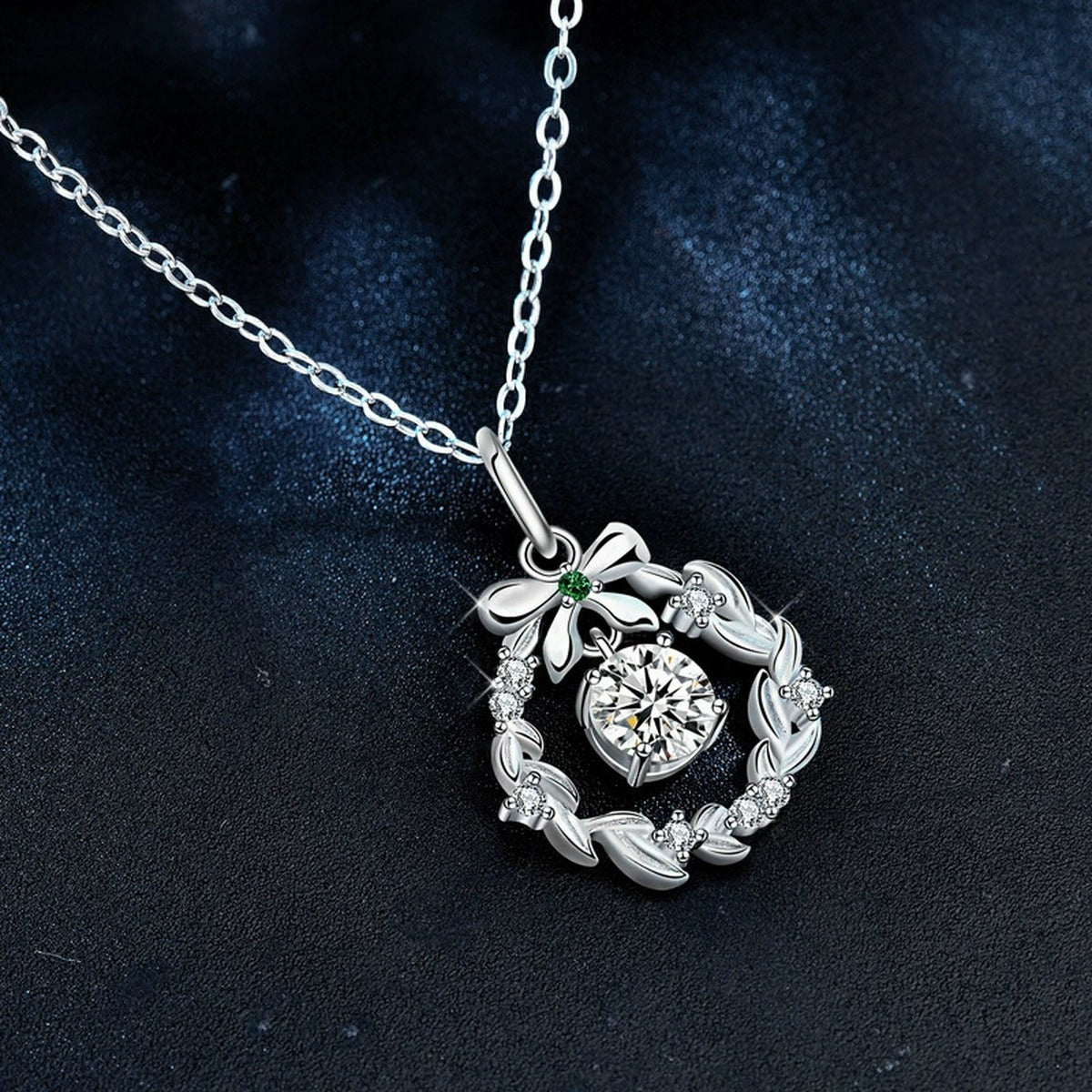 Christmas Wreath Round Moissanite Necklace with Green CZ in White Gold-Plated S925 sterling silver blue display scene showing chain and stone layout