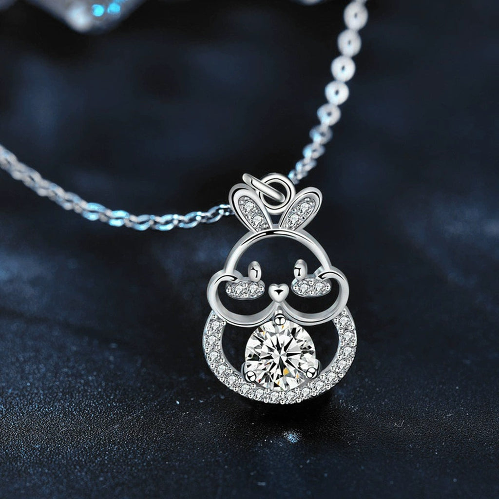 Bunny Round Moissanite Necklace with CZ in White Gold-Plated S925 sterling silver blue display scene showing chain and stone layout