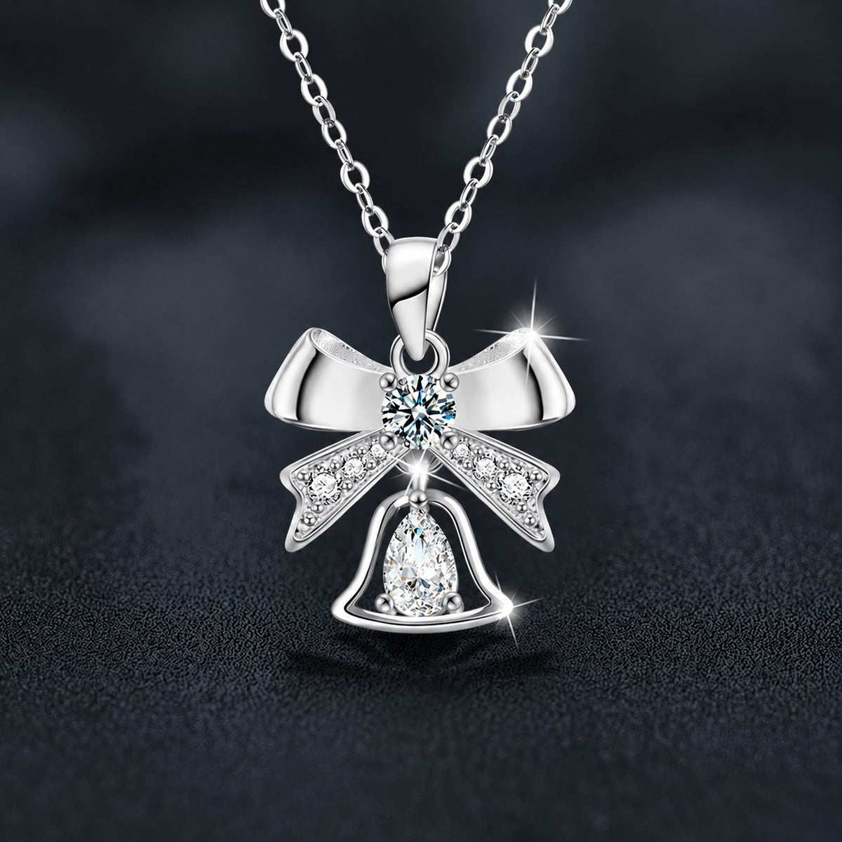 Bowknot Bell Pear Cut Moissanite Necklace with CZ in White Gold-Plated S925 sterling silver close-up product scene showing pendant setting