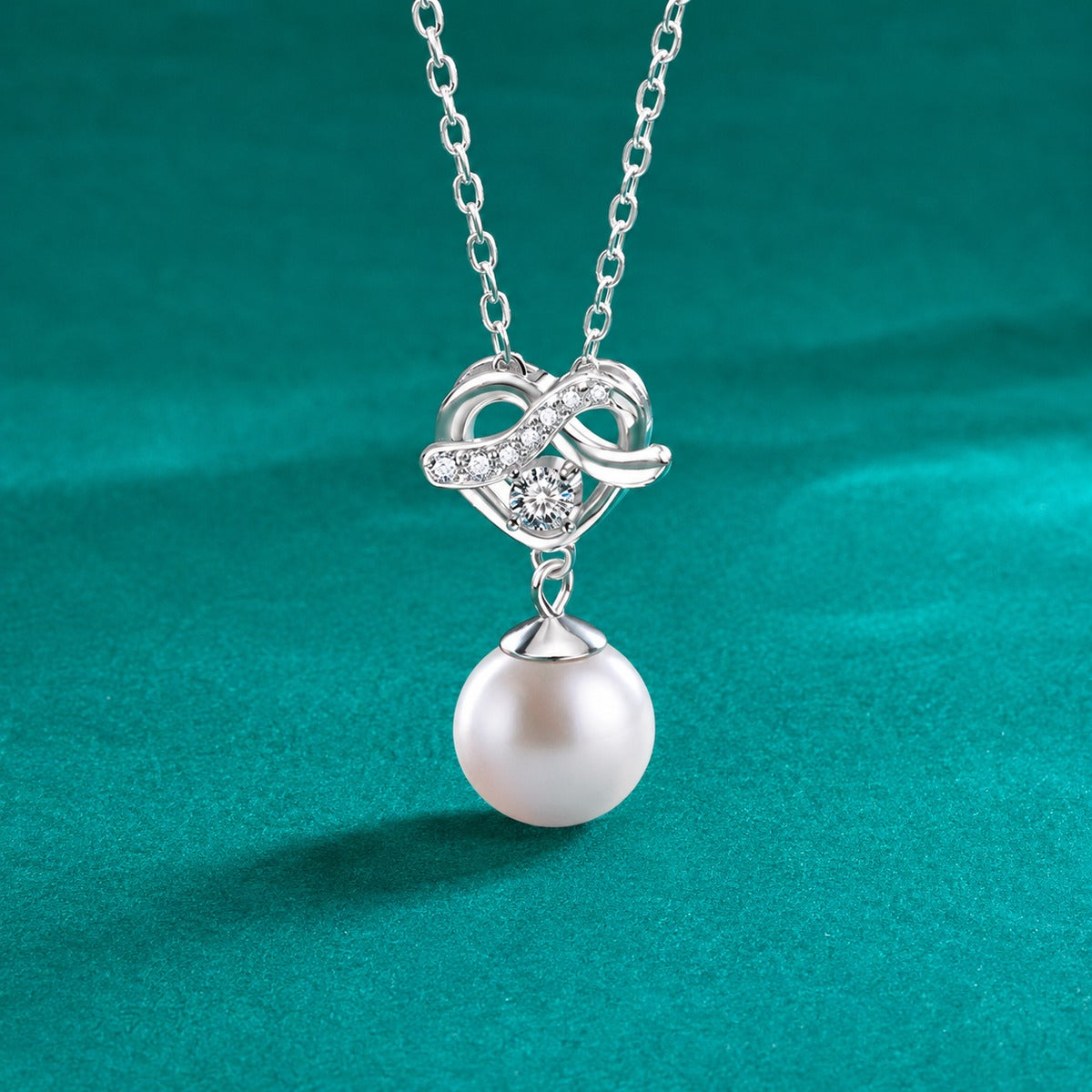 Heart Pearl Round Moissanite Necklace with CZ in Gold-Plated S925 sterling silver close-up styled product scene showing pendant setting