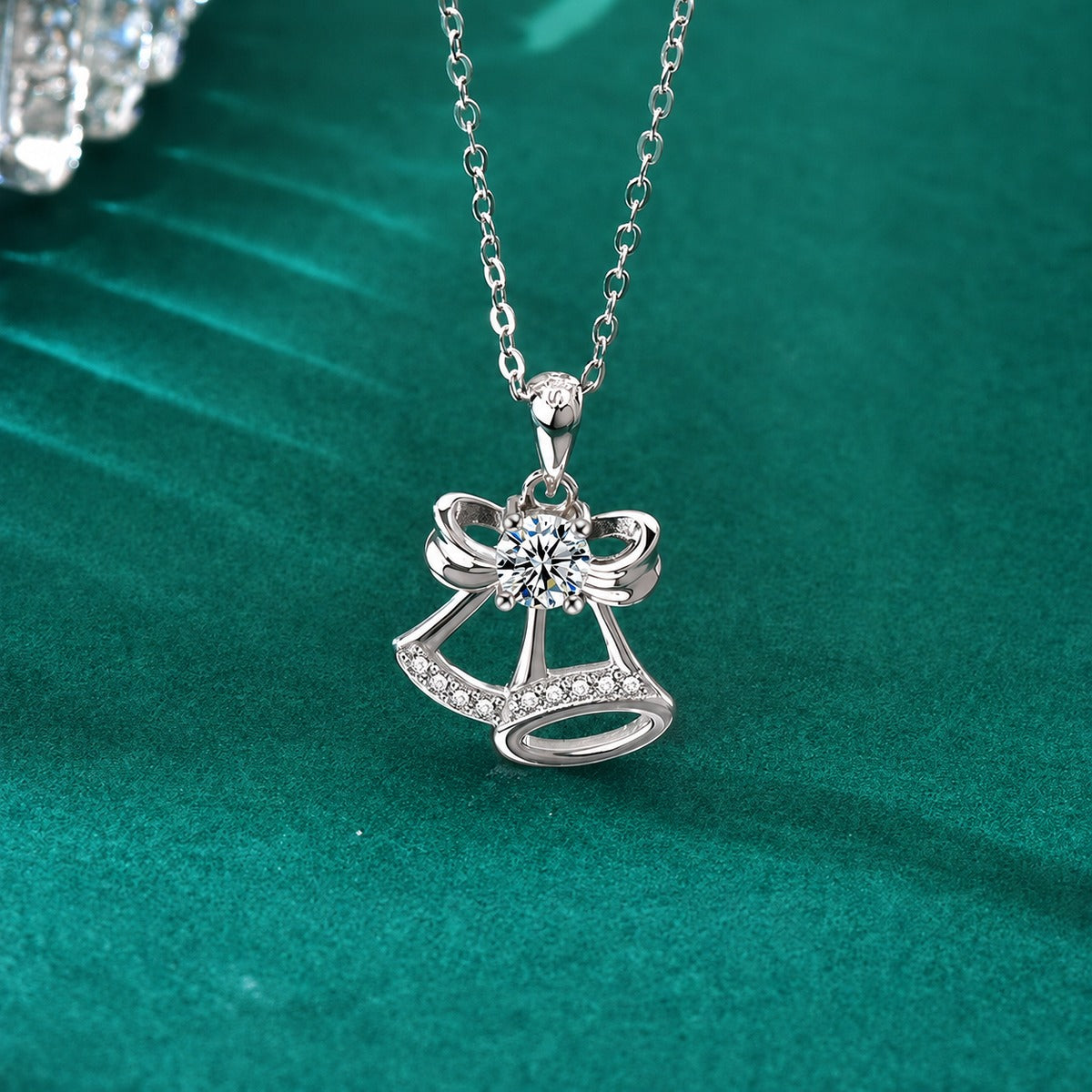 Christmas Bell Round Moissanite Necklace with CZ in Gold-Plated S925 sterling silver close-up styled product scene showing pendant setting