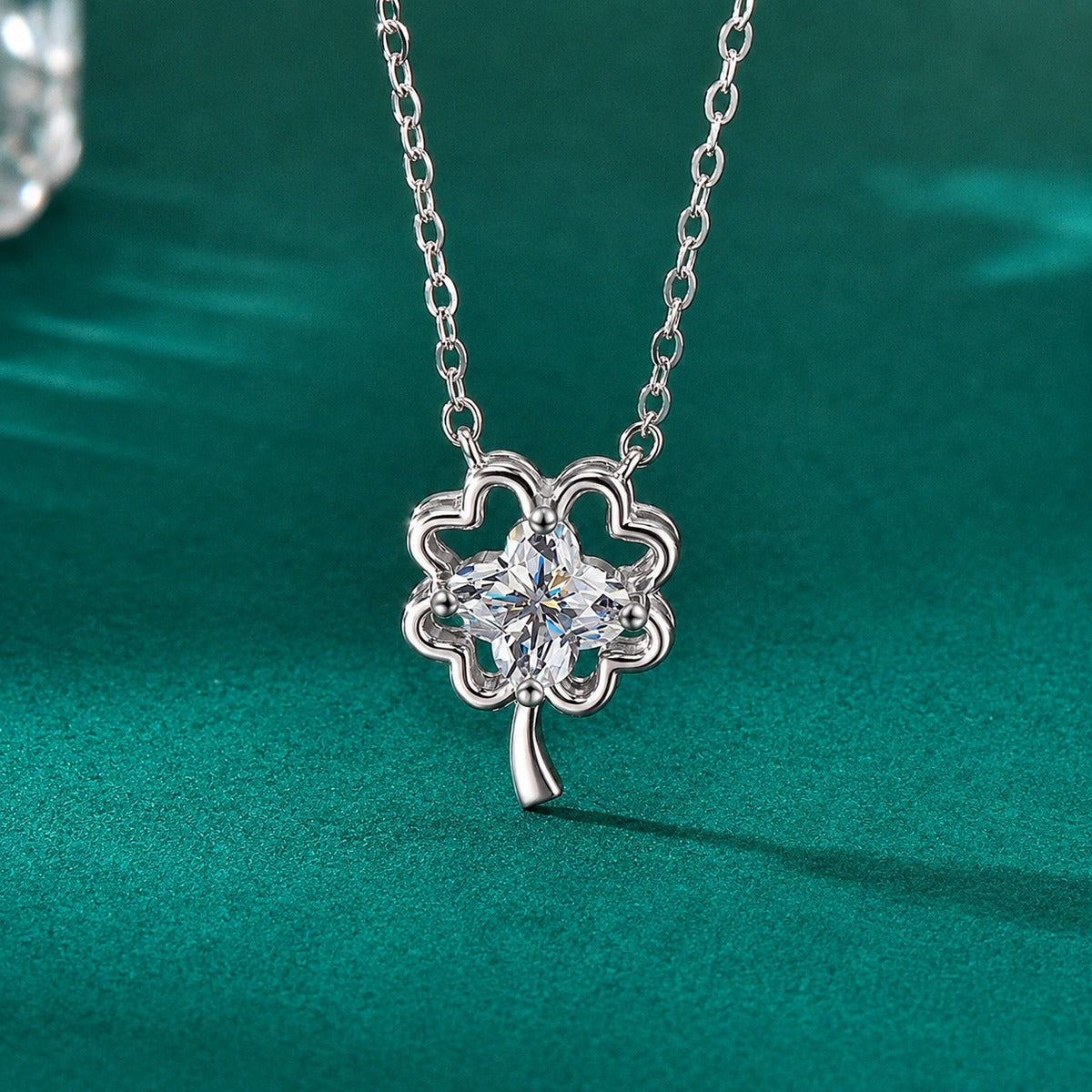 Four-Leaf Clover Cut Moissanite Necklace in Gold-Plated S925 sterling silver close-up styled product scene showing pendant setting