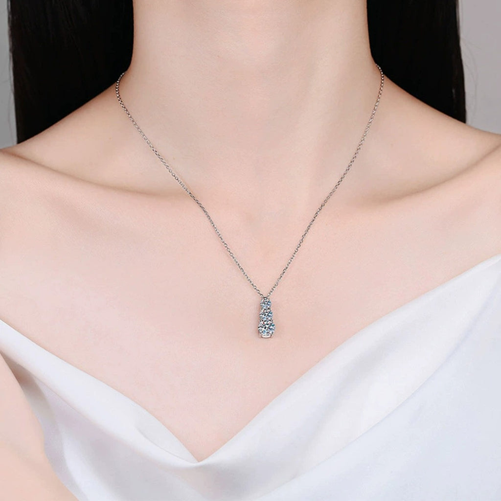 Vertical Three-Stone Moissanite Necklace in Gold-Plated S925 sterling silver neckline model view showing pendant scale and chain length