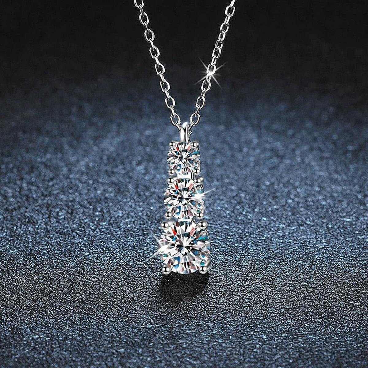 Vertical Three-Stone Moissanite Necklace in Gold-Plated S925 sterling silver close-up product scene showing pendant setting