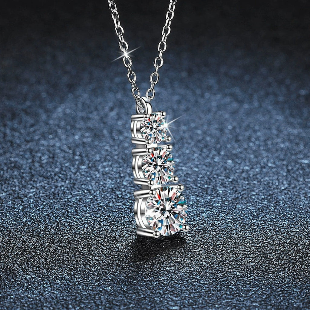Vertical Three-Stone Moissanite Necklace in Gold-Plated S925 sterling silver blue display scene showing chain and stone layout