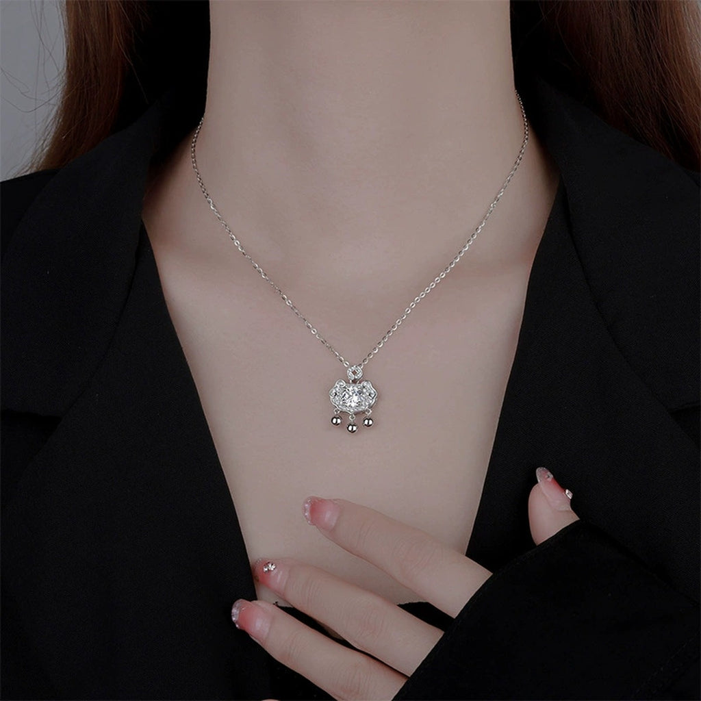 Ruyi Lock Round Moissanite Necklace with CZ in White Gold-Plated S925 sterling silver neckline model view showing pendant scale and chain length