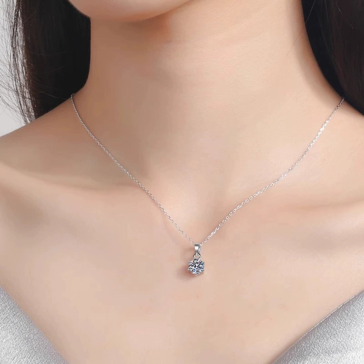 Six-Prong Round Moissanite Solitaire Necklace in Gold-Plated S925 sterling silver neckline model view showing pendant scale and chain length