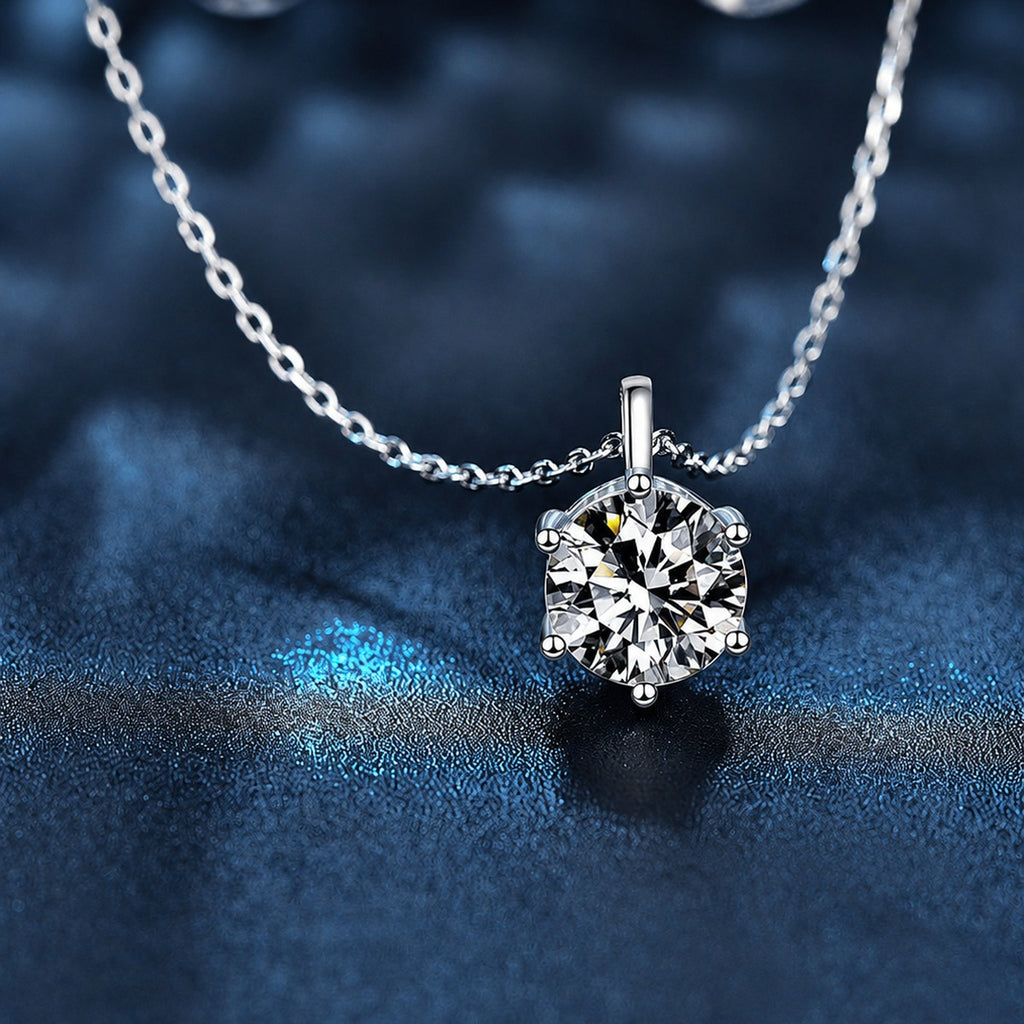 Six-Prong Round Moissanite Solitaire Necklace in Gold-Plated S925 sterling silver close-up styled product scene showing pendant setting