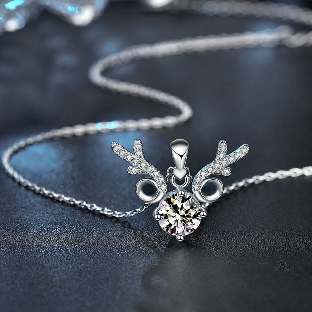 Antler Round Moissanite Necklace with CZ in White Gold-Plated S925 sterling silver blue display scene showing chain and stone layout