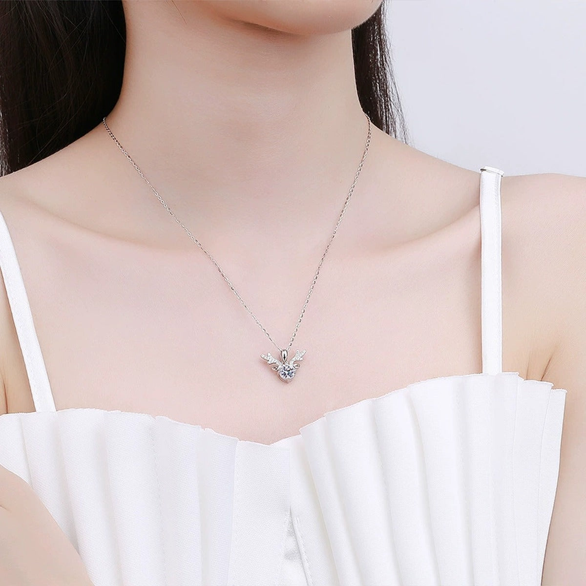 Antler Round Moissanite Necklace with CZ in White Gold-Plated S925 sterling silver neckline model view showing pendant scale and chain length
