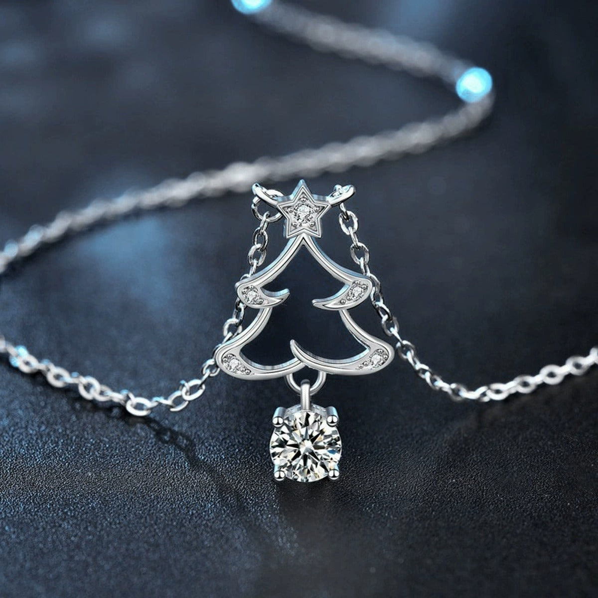 Christmas Tree Round Moissanite Necklace with CZ in White Gold-Plated S925 sterling silver blue display scene showing chain and stone layout