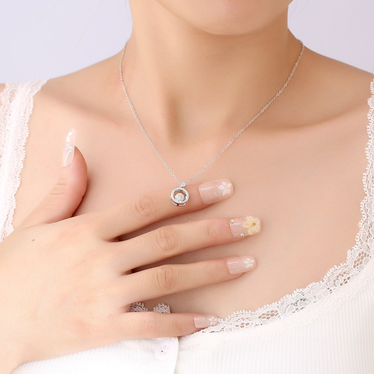 Dancing Round Moissanite Halo Necklace with CZ in Gold-Plated S925 sterling silver additional worn styling view showing the pendant on the body