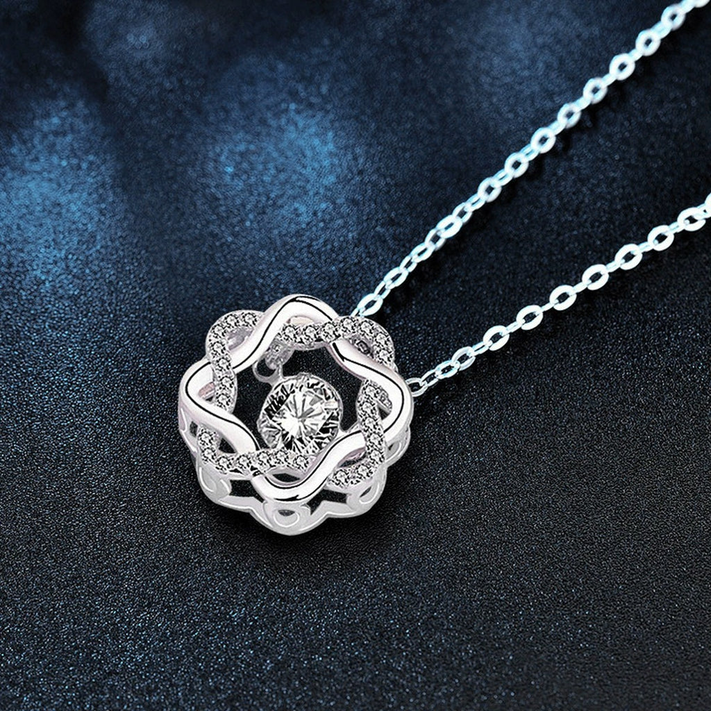 Eight-Petal Star Round Moissanite Necklace with CZ in White Gold-Plated S925 sterling silver blue display scene showing chain and stone layout