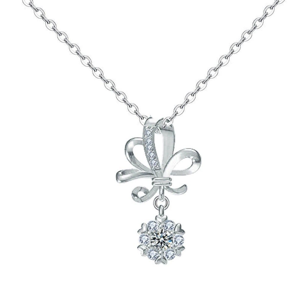Bowknot Round Moissanite Necklace with CZ in White Gold-Plated S925 sterling silver white background product photo showing bowknot ribbon pendant with a small dangling round moissanite and CZ accents