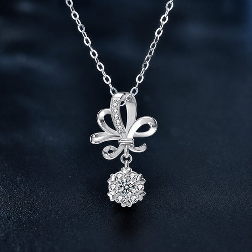 Bowknot Round Moissanite Necklace with CZ in White Gold-Plated S925 sterling silver close-up product scene showing pendant setting