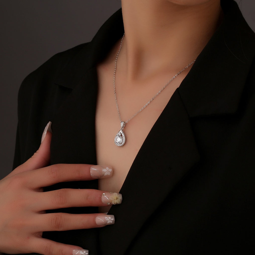 Teardrop Round Moissanite Necklace with CZ in White Gold-Plated S925 sterling silver neckline model view showing pendant scale and chain length